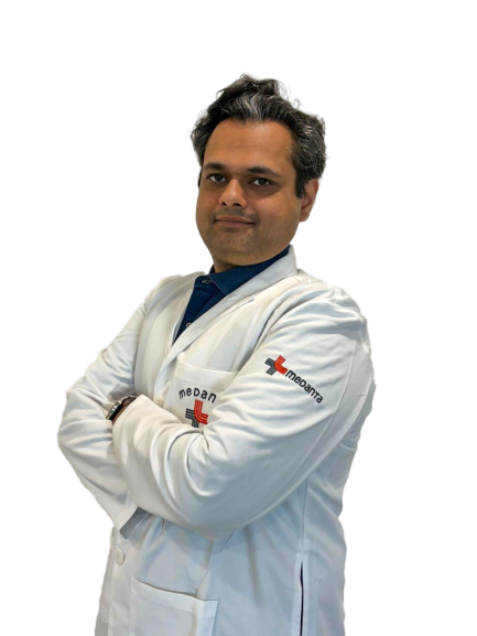 Dr. Manu Madan