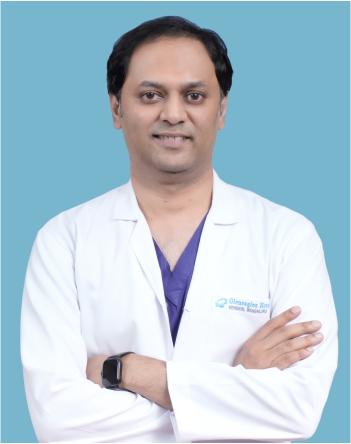 Dr. Adarsh C K